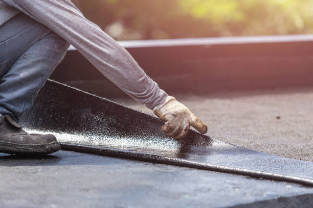 Professional Waterproofing technician working in Midland, WA